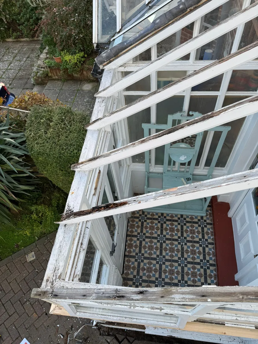 Conservatory roof opened up for repair
