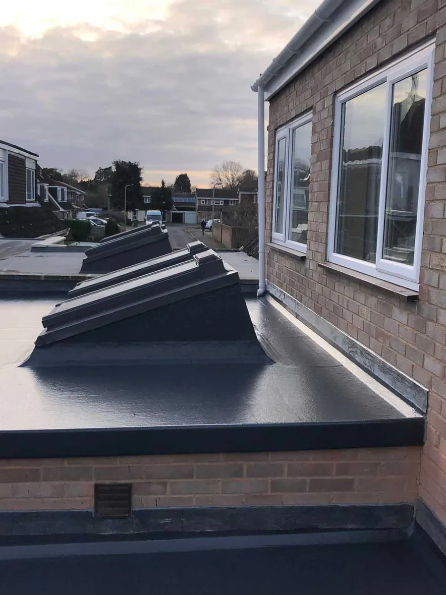 Flat roof finished around roof lanterns