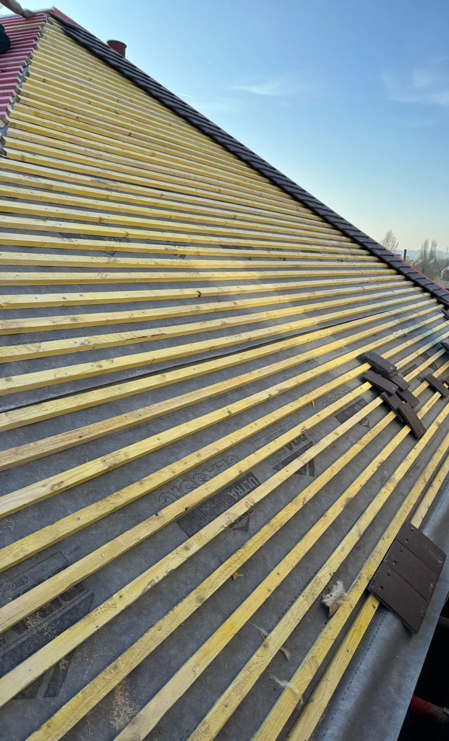 New battens over membrane on a long slope