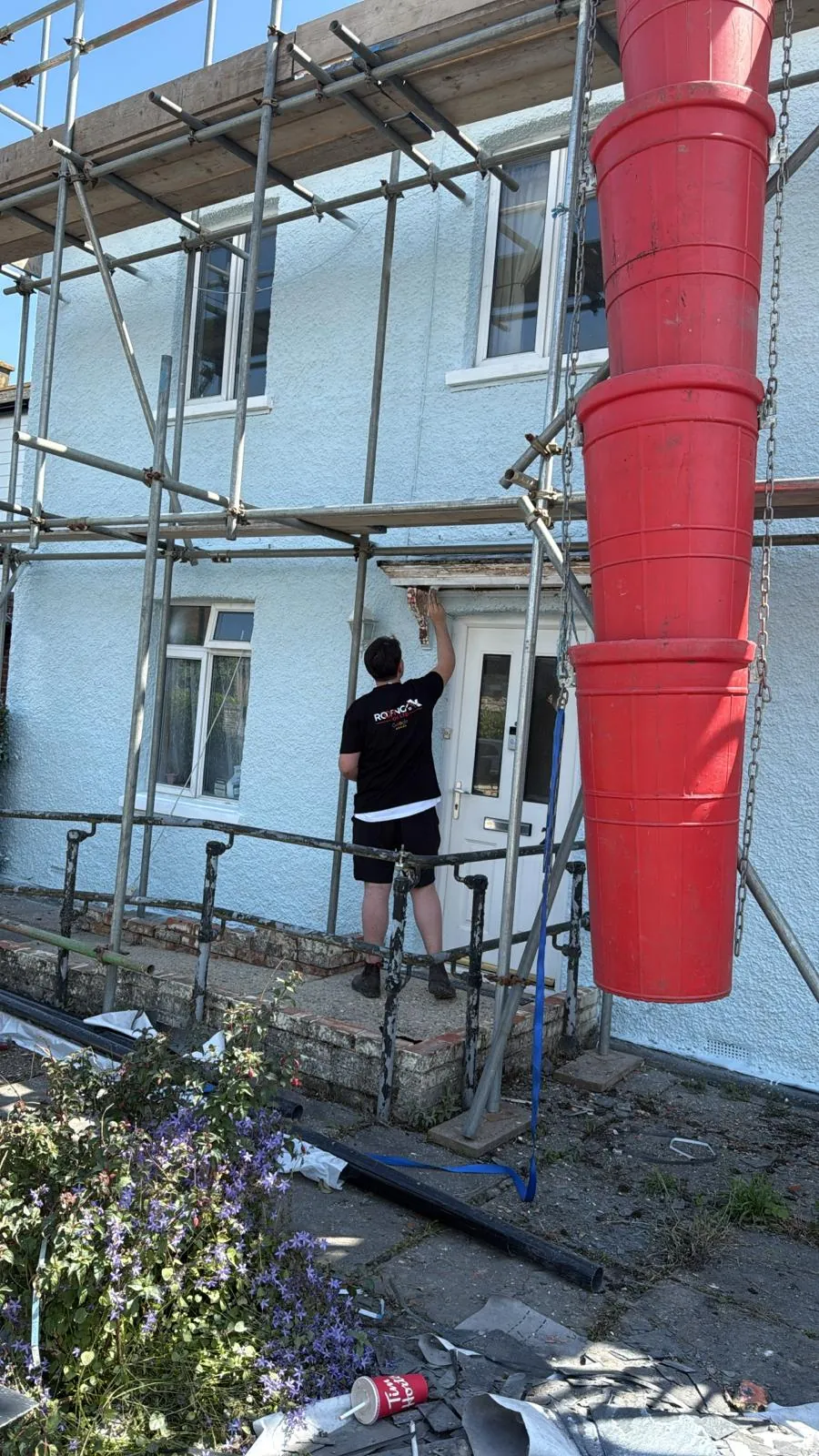 Exterior painting from the scaffold