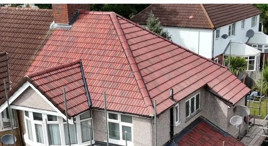 Red tiled hip roof on a bungalow