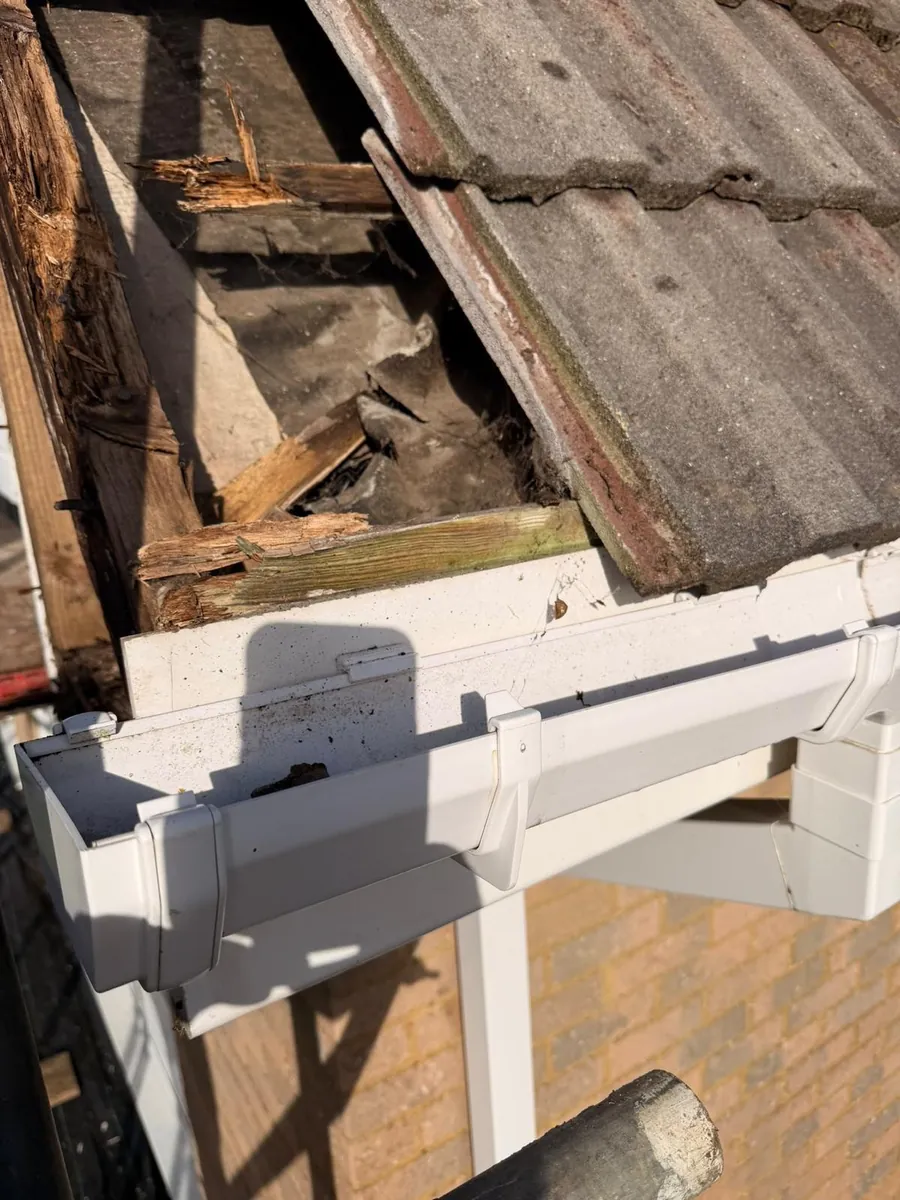 Rotten eaves opened up with new uPVC guttering ready to fit