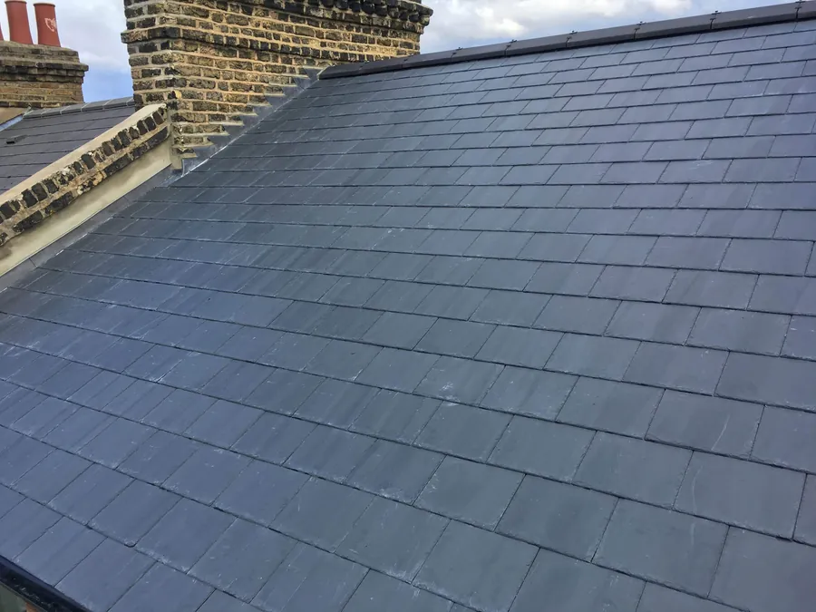 New natural slate roof finished on a terrace in New Cross
