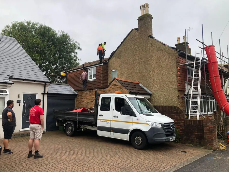 Team and pickup at a re-roof